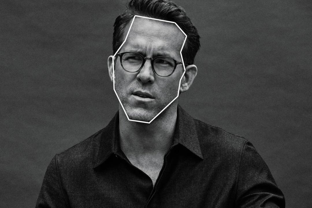 Greyscale image of man wearing glasses with white outline drawn around his face shape